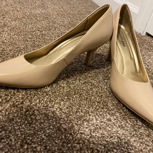Nude pump heels